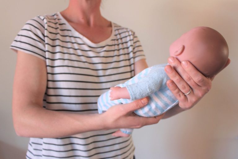 How to Hold a Baby 4 Common Positions and Important Tips Straight