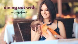 A new mom holds her newborn baby while sitting at a table in a restaurant with the caption: dining out with a newborn