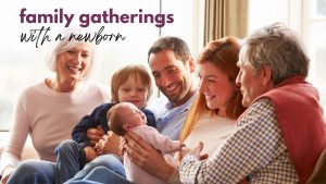 A multigeneration family sit smiling at a newborn baby